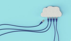 Image of ethernet cords plugging into a cloud.