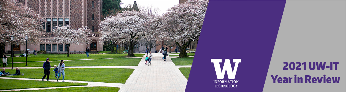 University campus walkway with cherry blossom trees in bloom, UW information technology, 2021 UW-IT Year in Review