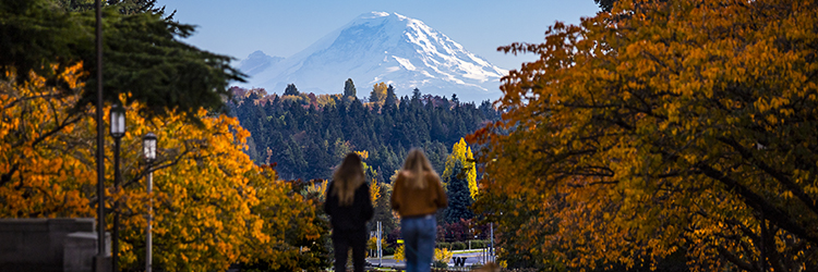 UW Seattle campus view of Mount Rainier. Information Technology. 2022 UW-IT Year in Review.